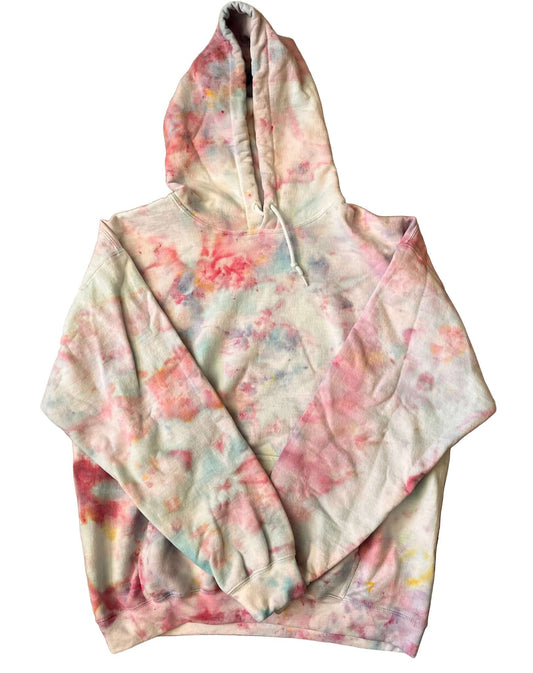 Floral patterned hoodie on a brown surface